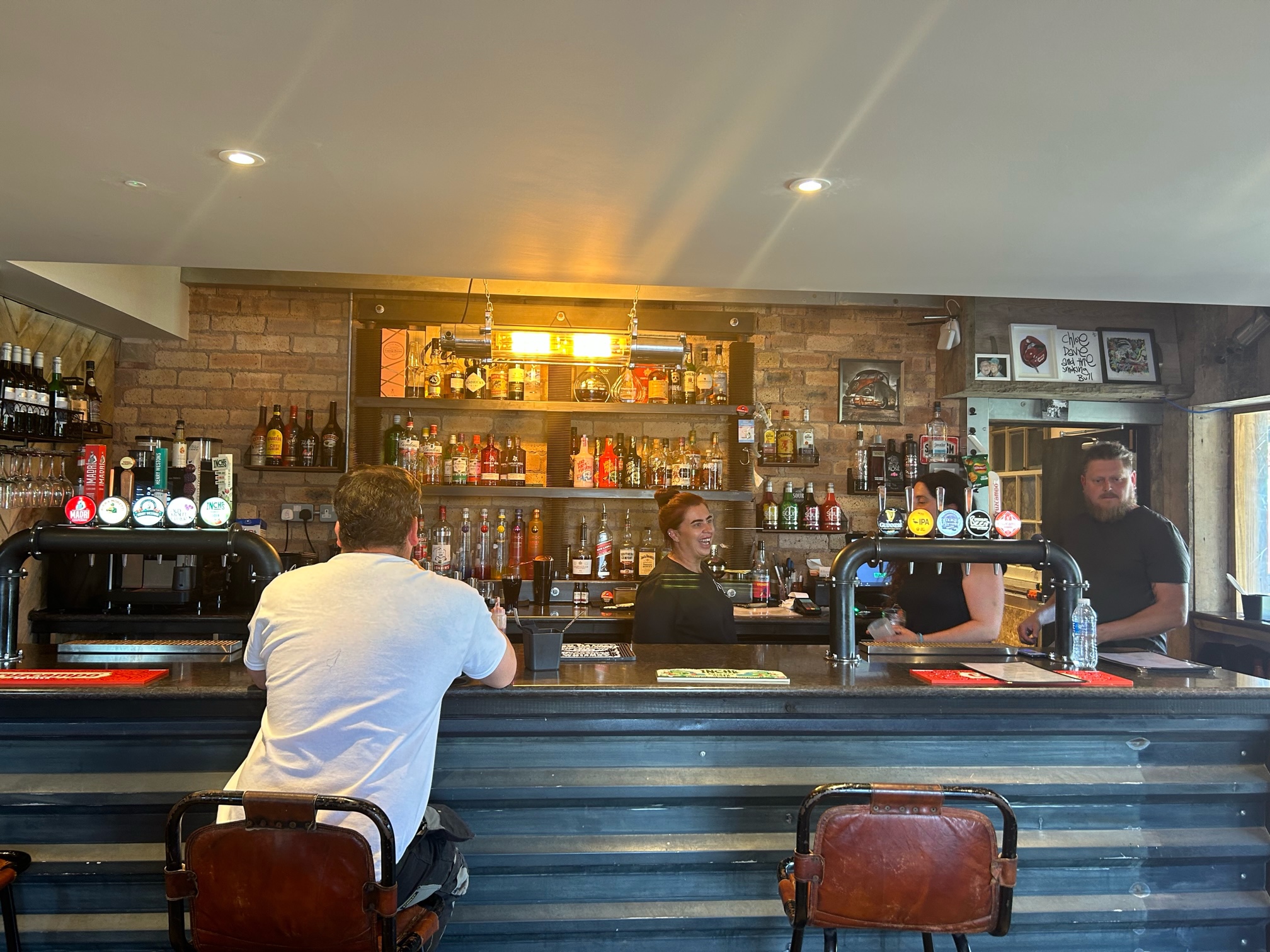 bar with people behind it